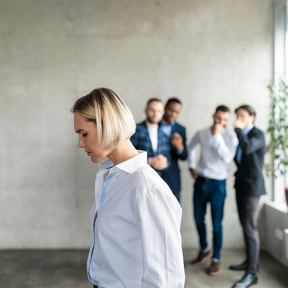 Young woman being discriminated against in the workplace