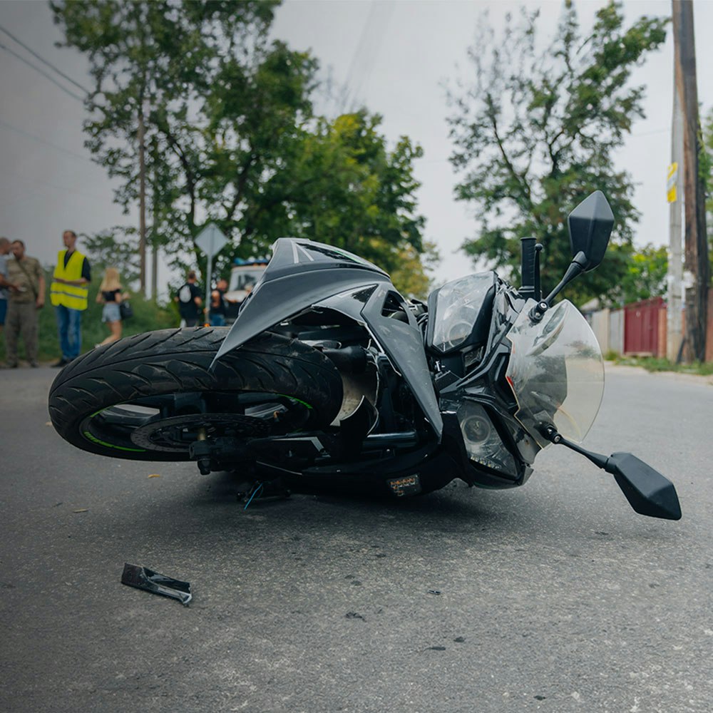 Motorcycle on its side after crash