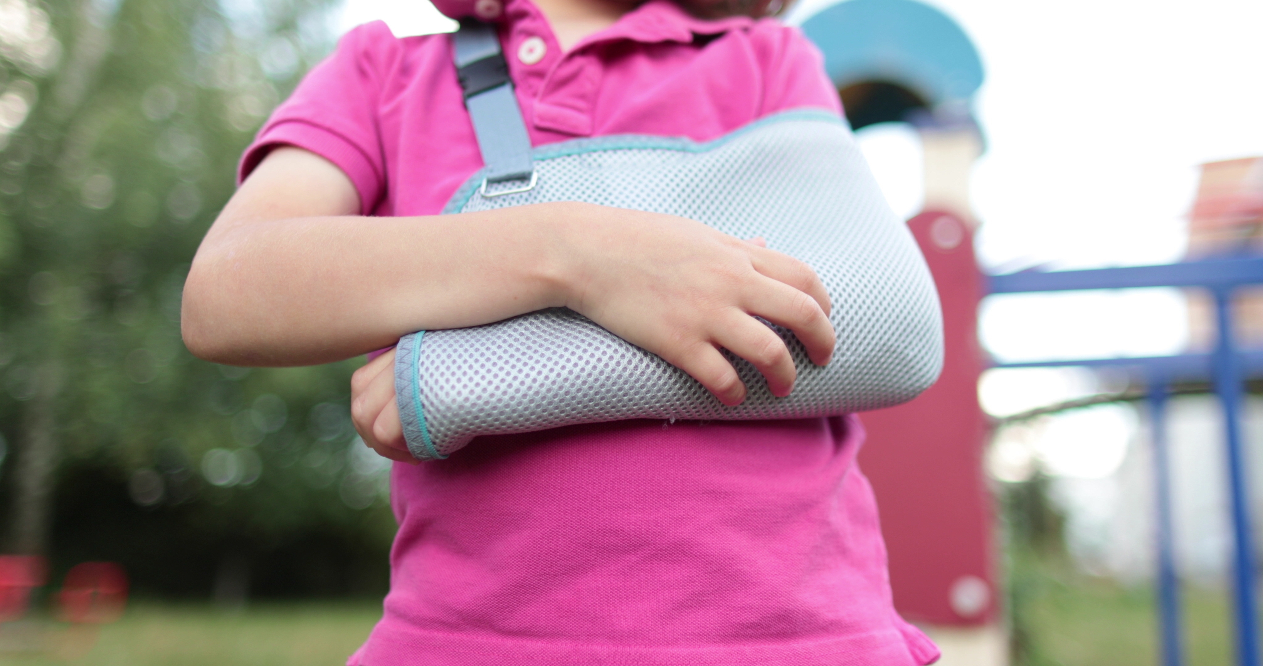 close up of child in an arm brace