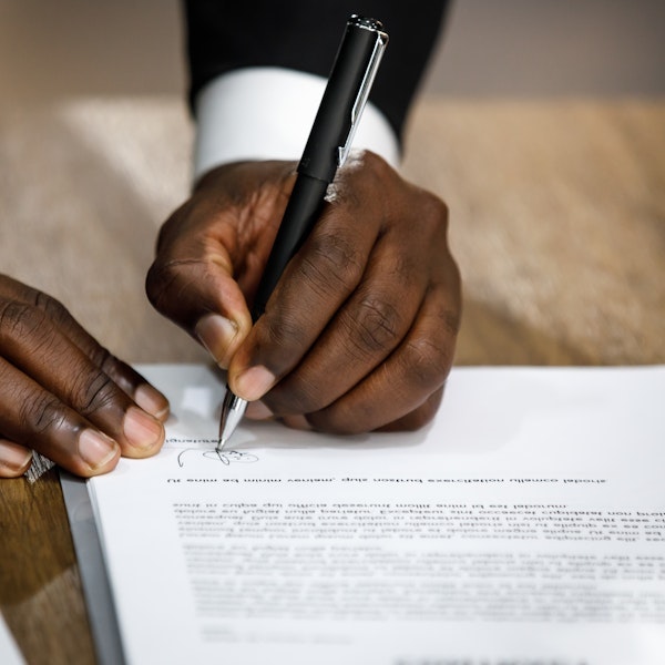 Worker signing contract