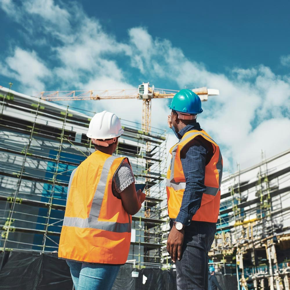 Construction workers on scaffolding