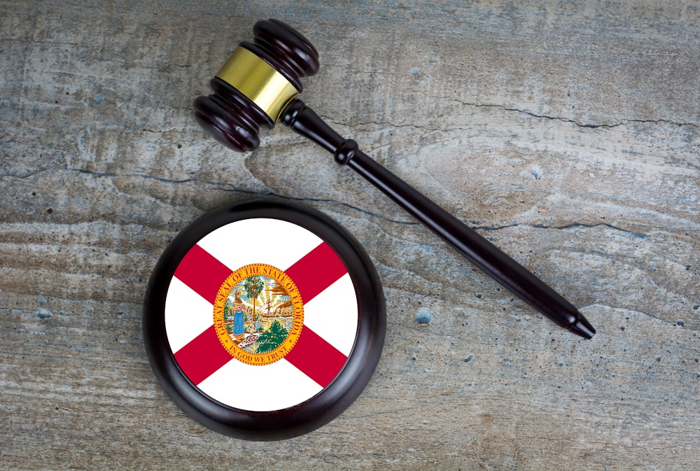 gavel with the Florida flag on the block