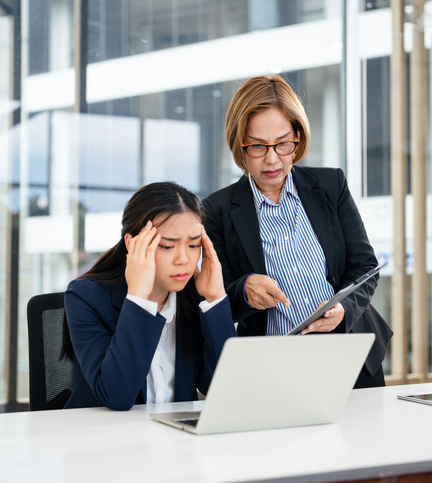 boss scolding employee