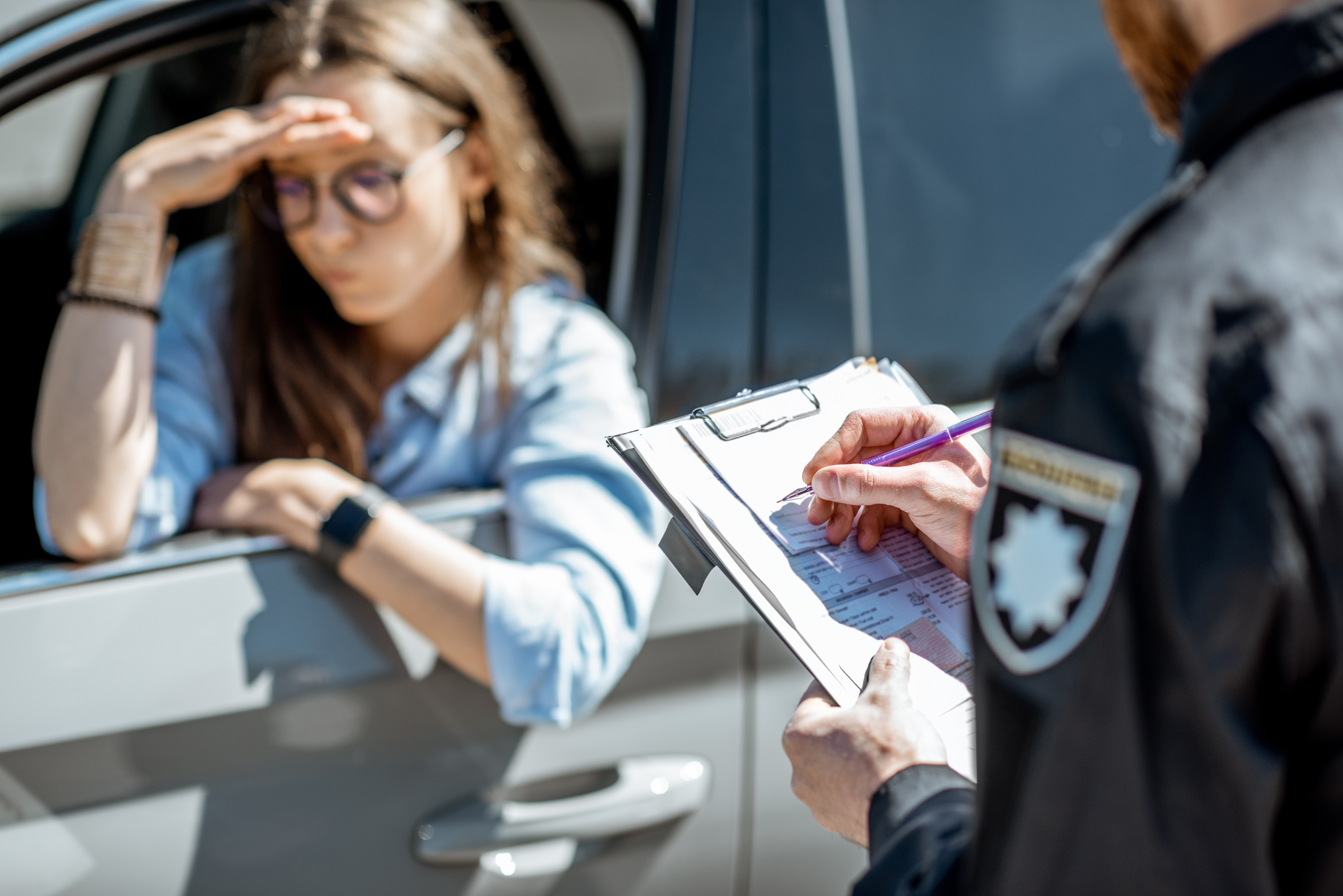 Woman getting a ticket