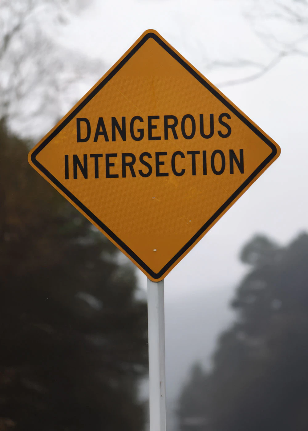 Dangerous Intersection Road Sign