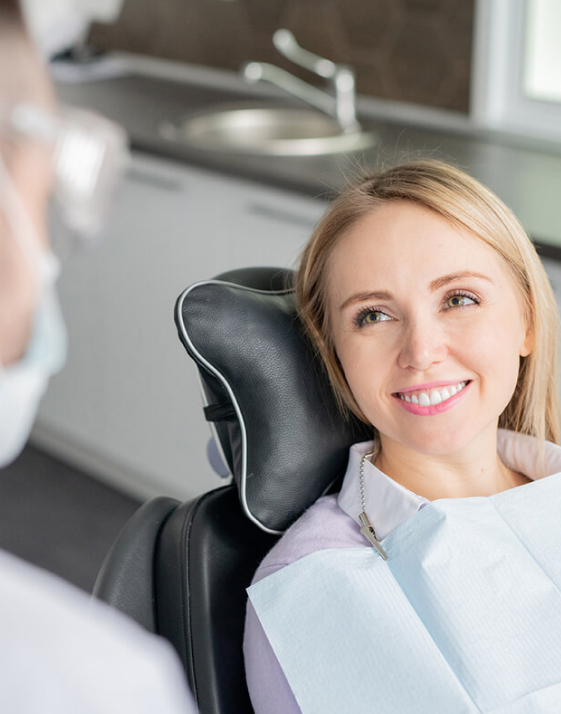 smiling woman in dentist