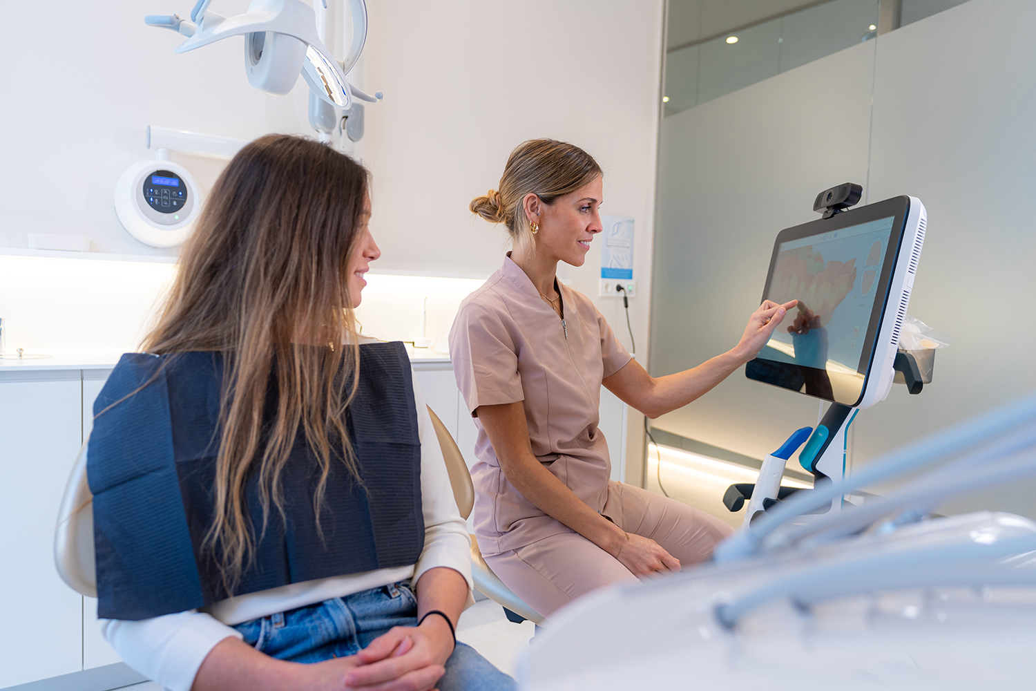 Doctor looking at xrays with patient