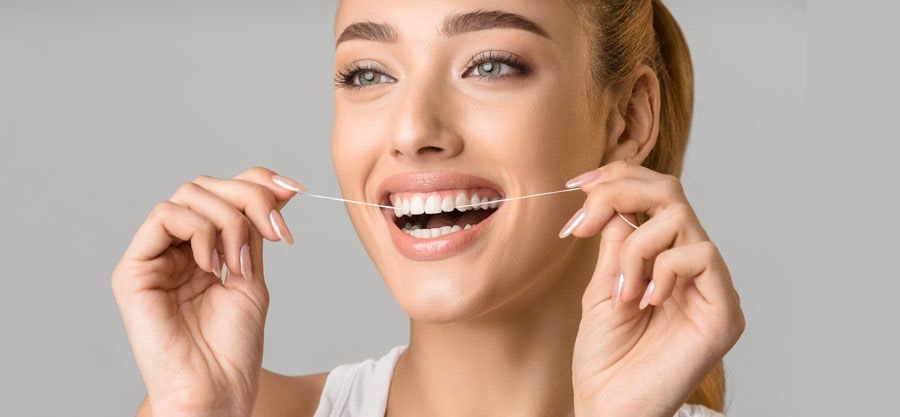 woman flossing