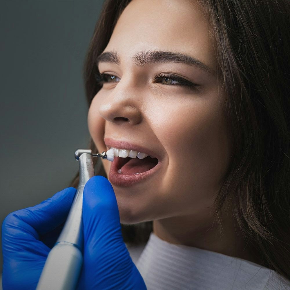 woman receiving a teeth cleaning