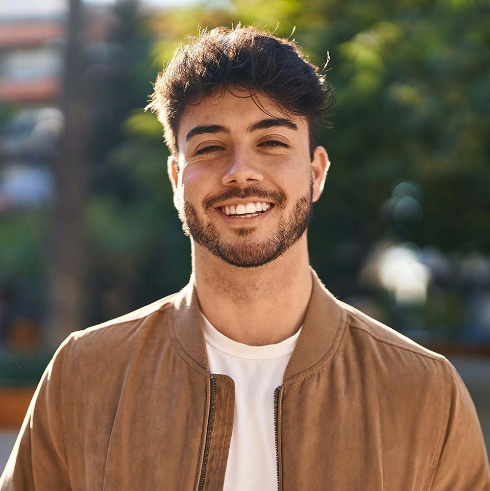 Young man with veneers smiling