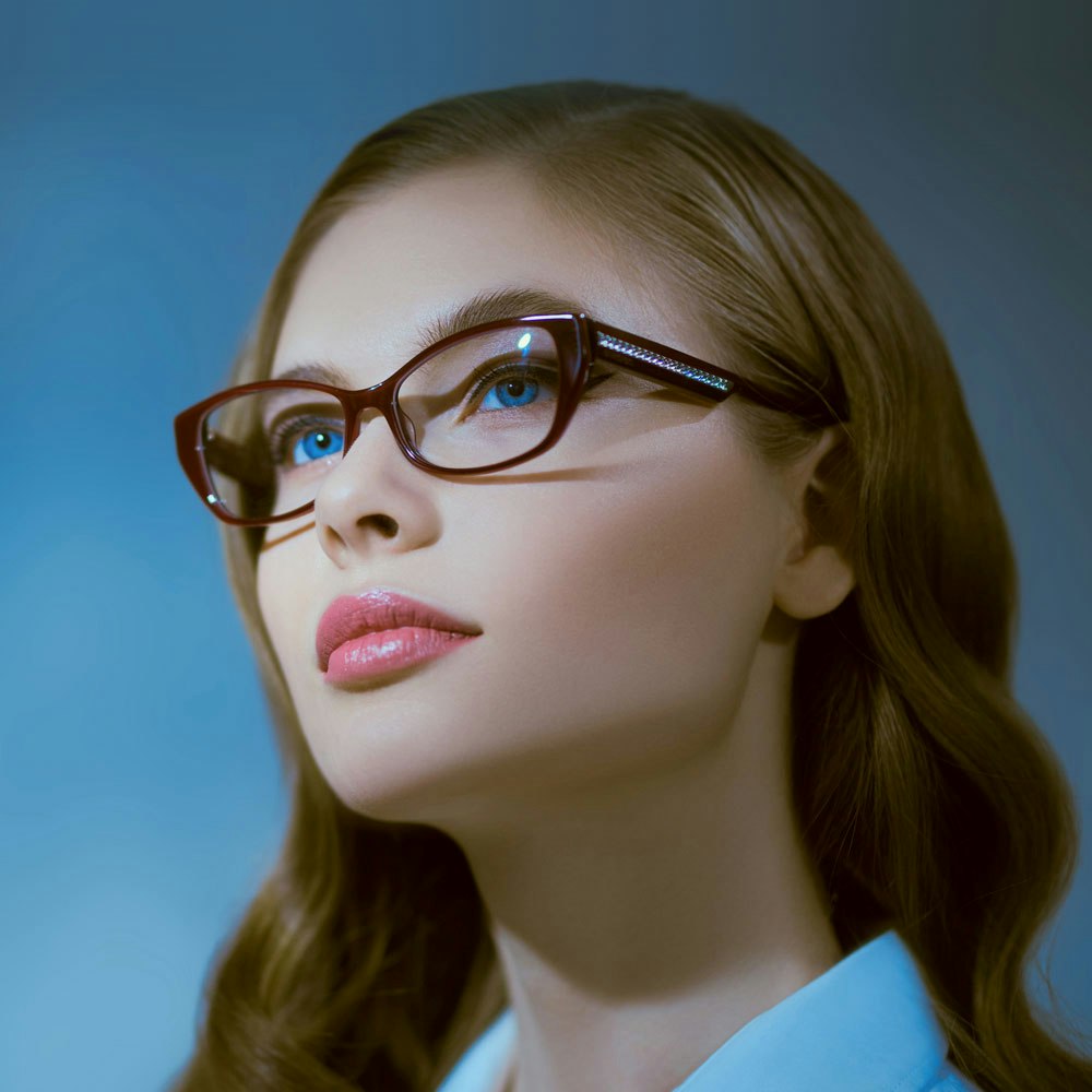 A young woman wearing glasses