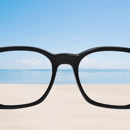 clear view of the ocean through glasses blurry view outside of the glasses