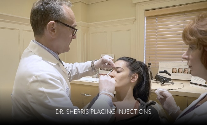 Dr. Sherris giving patient injections