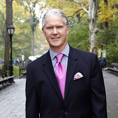 dr. jon turk in a suit