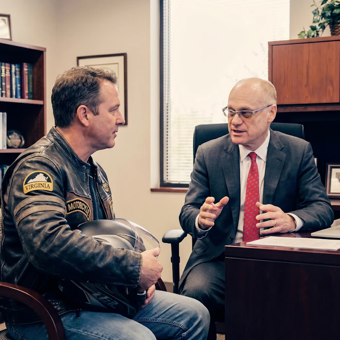 Josh Silverman talking to client