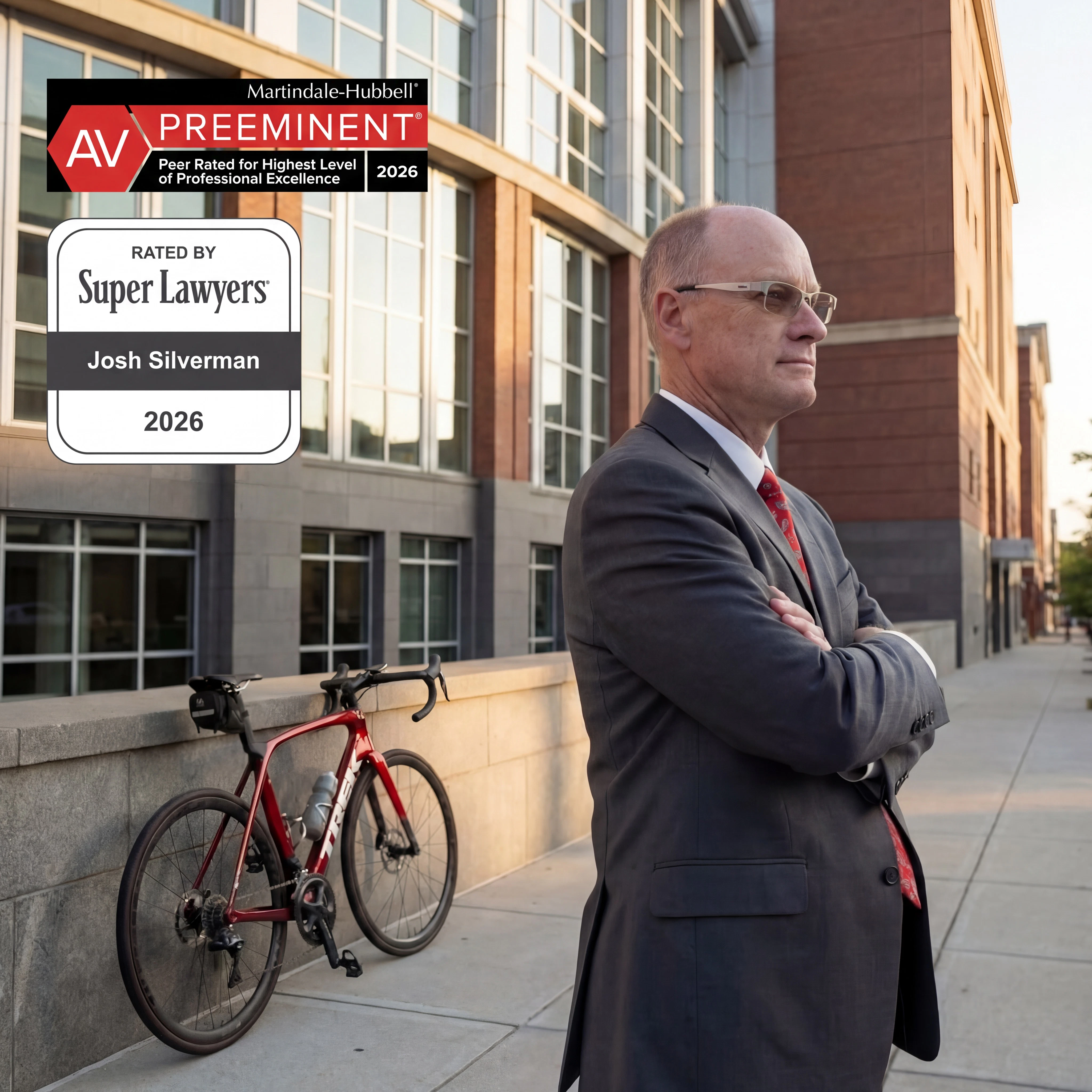 Mr. Silverman standing outside with images of Super Lawyer and AV Preeminent awards for 2026