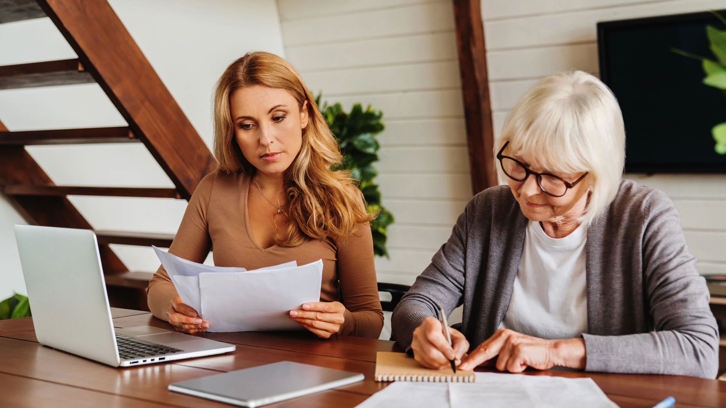 women reviewing documents