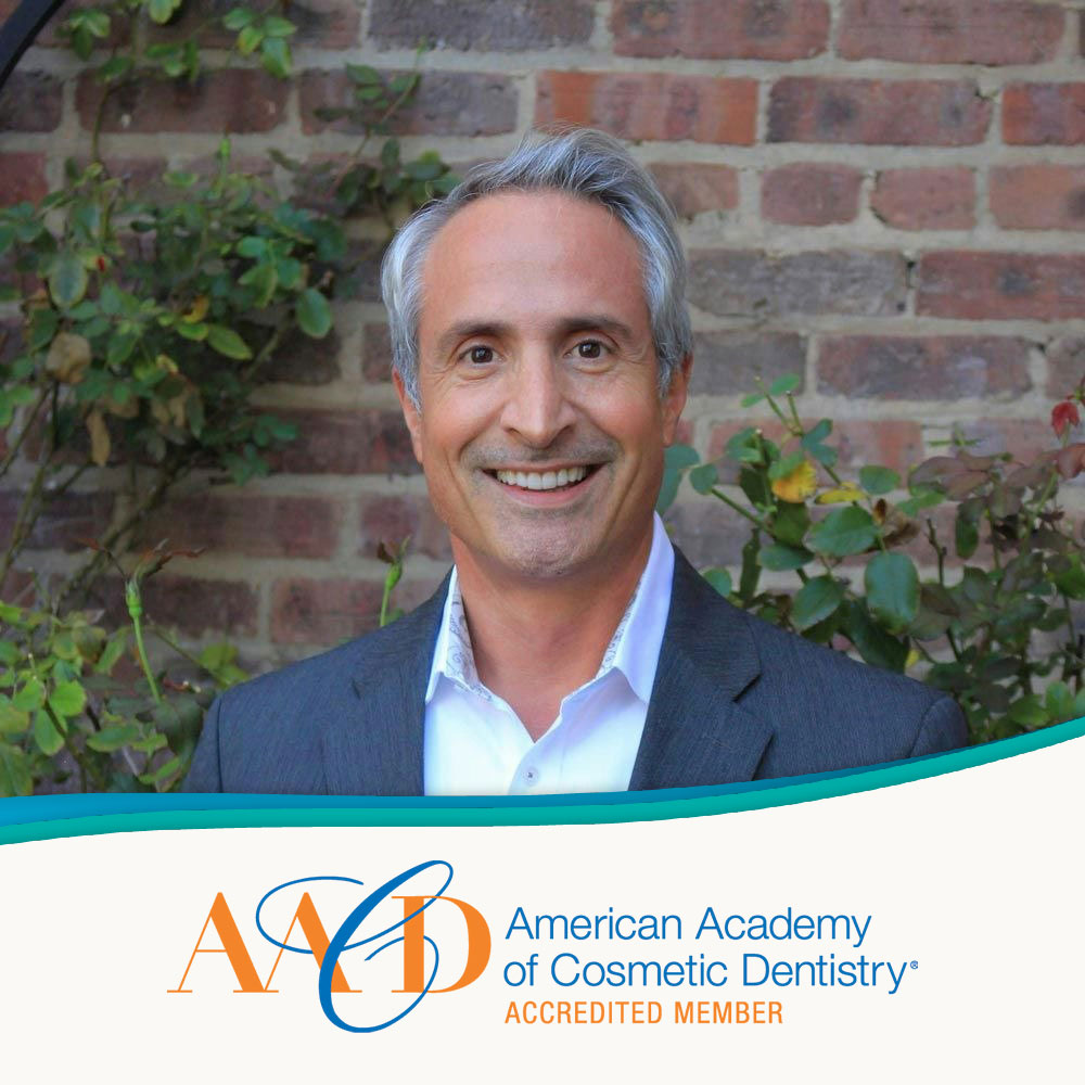 Dr. Nick Pournaras with AACD accreditation logo