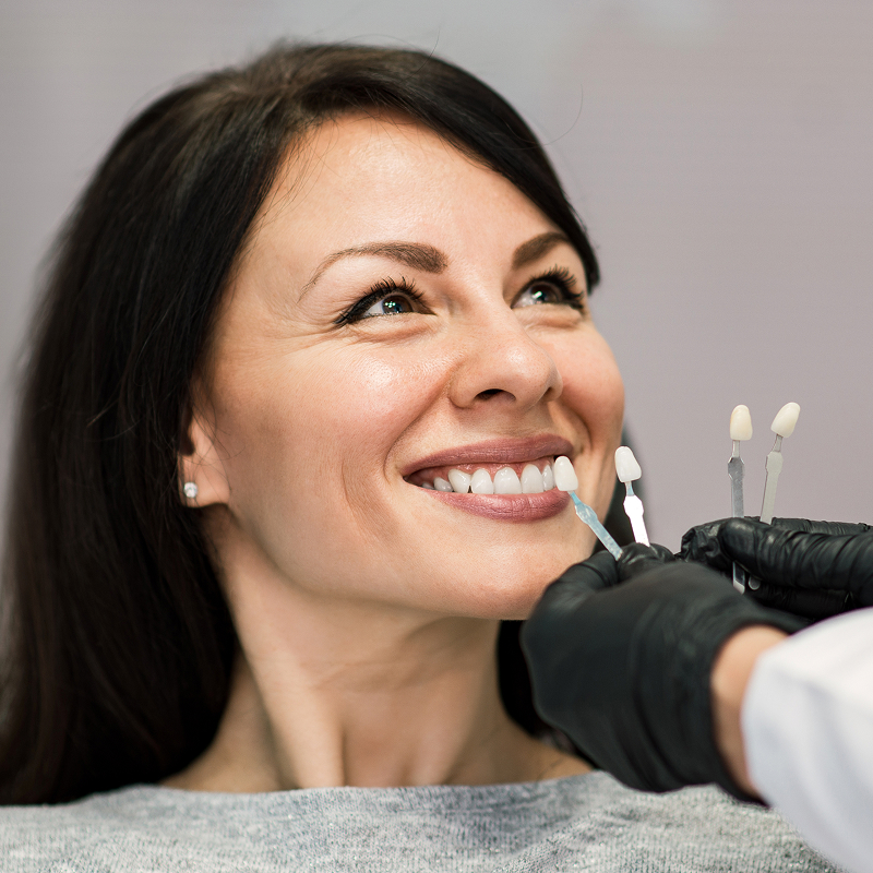 Woman getting her teeth professionally whitened