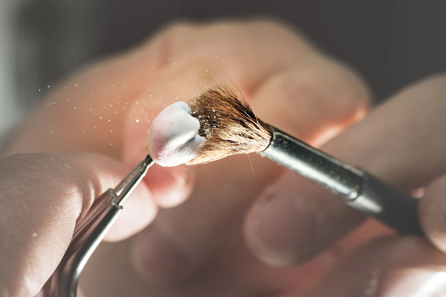 ceramist working on a dental crown