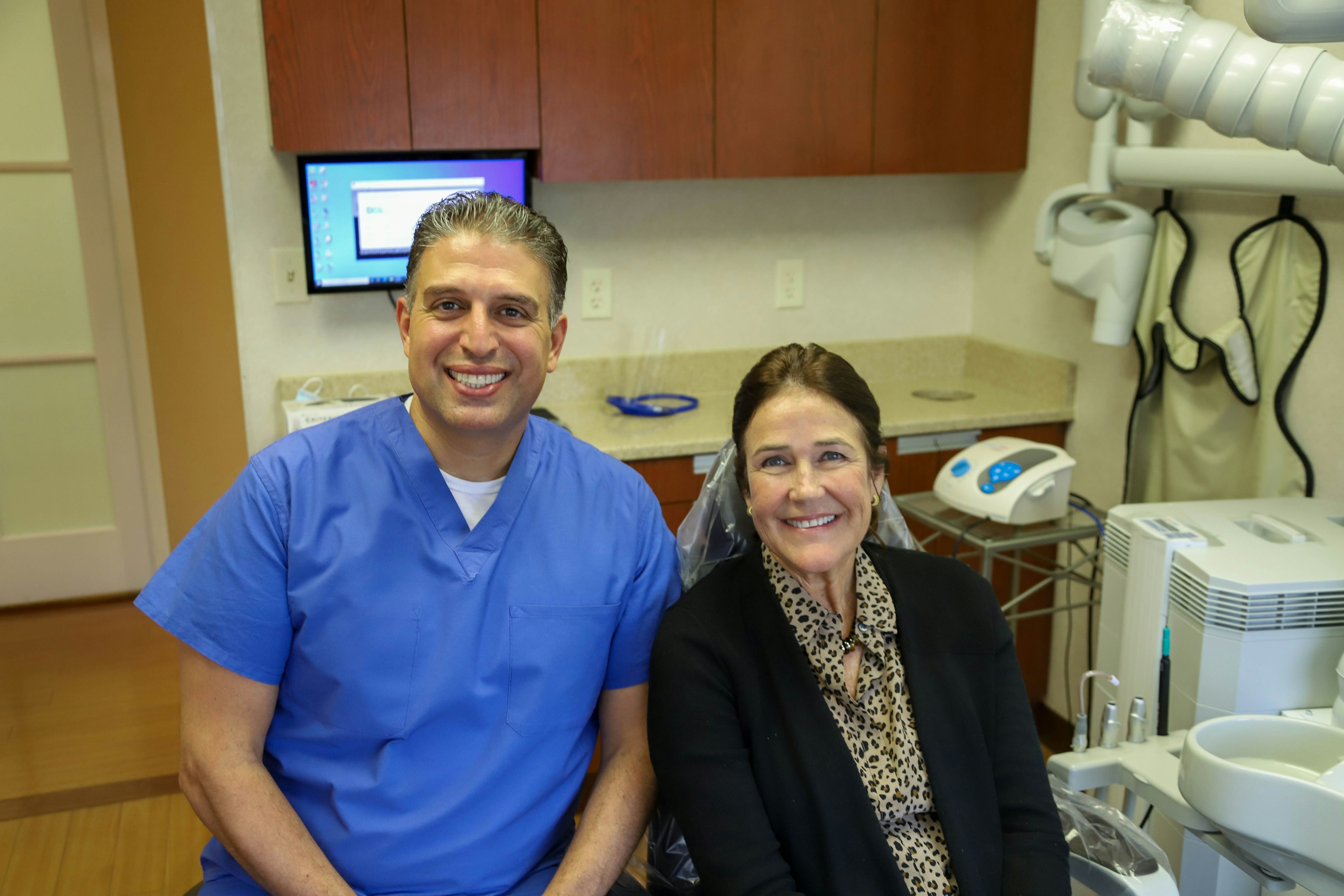 Dr. Stephen J. Malki with a patient