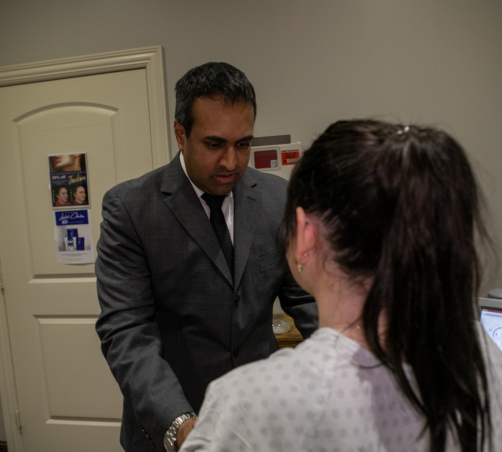 Dr. Rumalla meeting with a patient