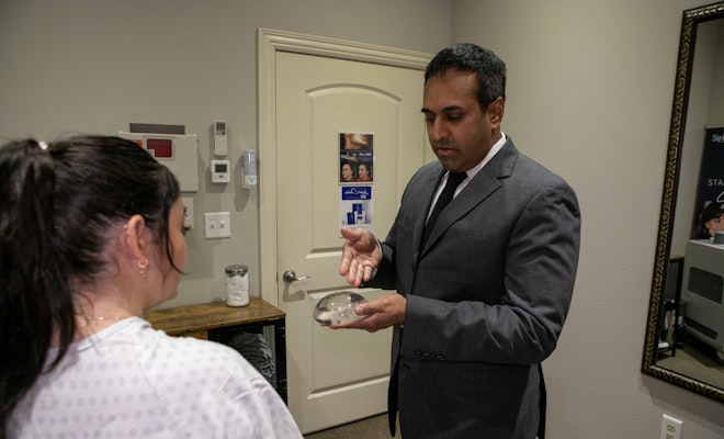 Dr. Rumalla showing patient implant options