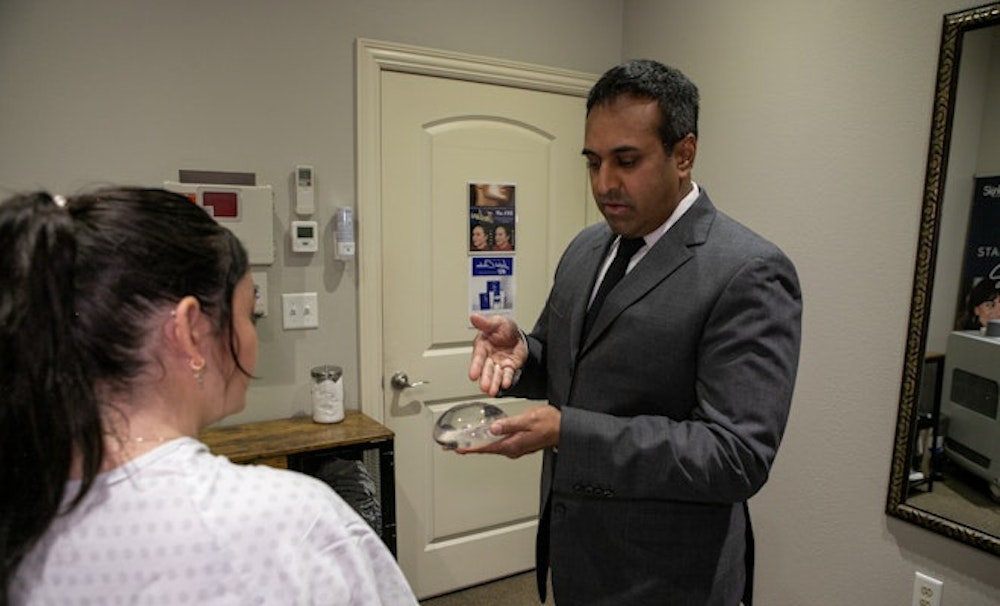 Dr. Rumalla showing patient implant options