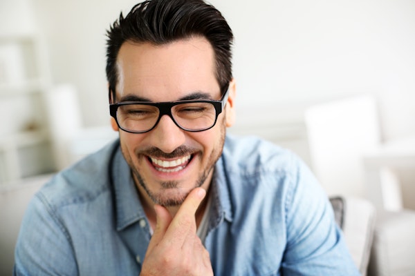 Man in glasses smiling