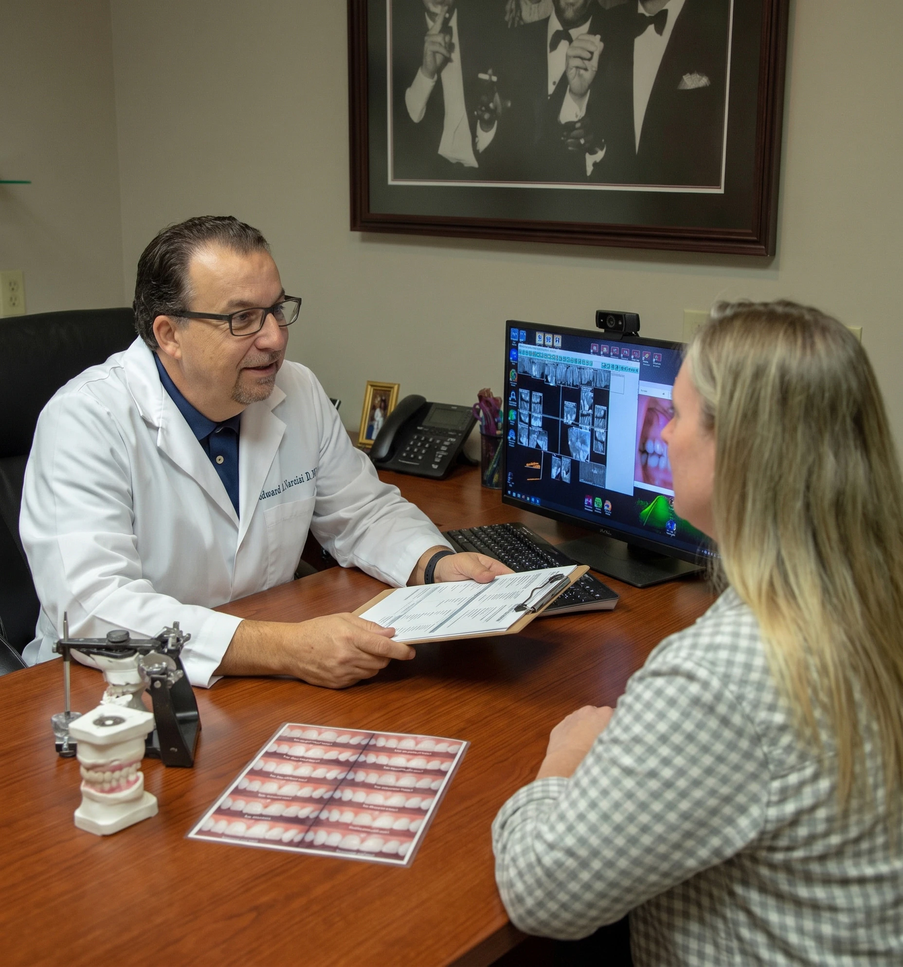 Dr. Narcisi meets with a patient