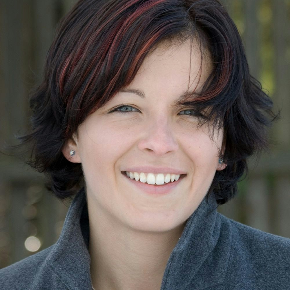 Smiling woman with short dark hair