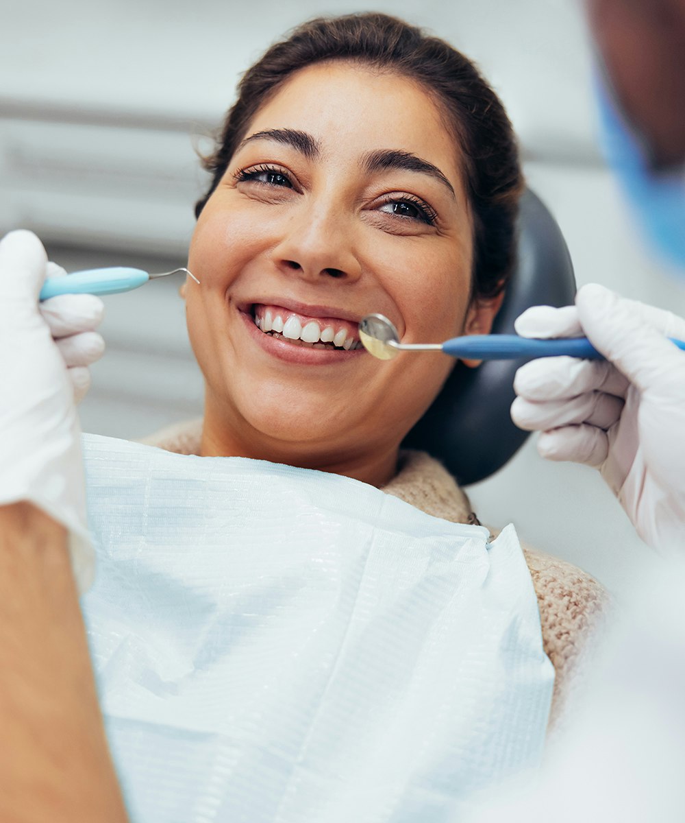 Smiling woman in dental chair