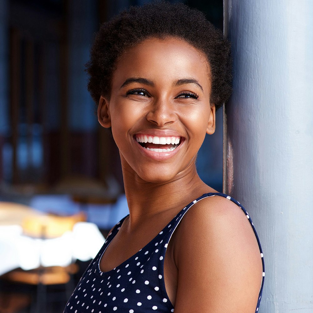 Smiling woman looking down