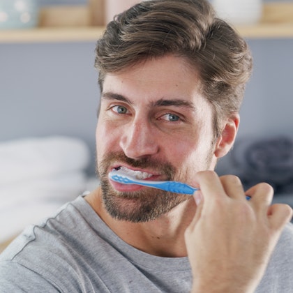 Man brushing his teeth