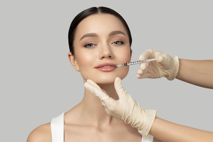 woman getting lip injections