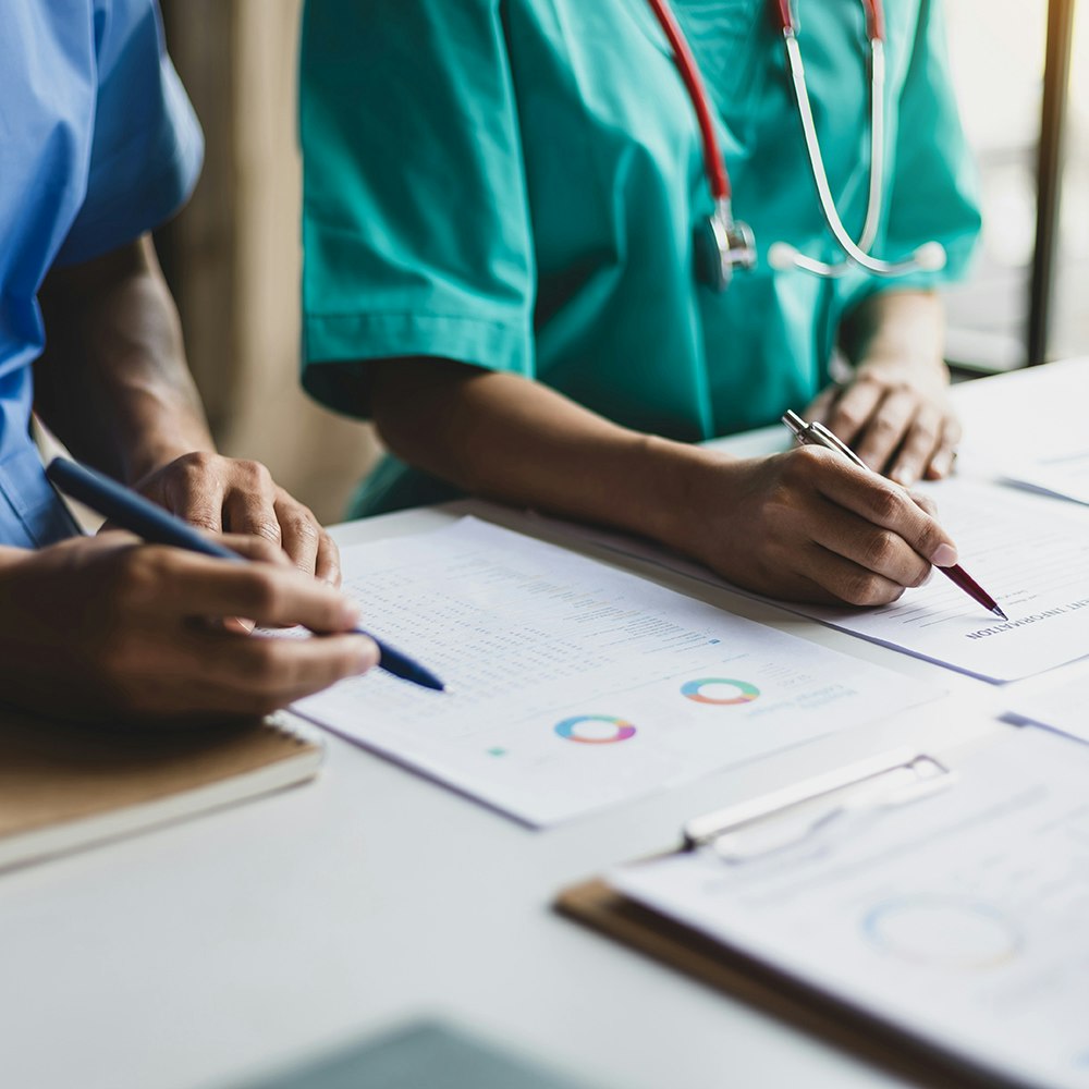 Nurse reviewing paperwork