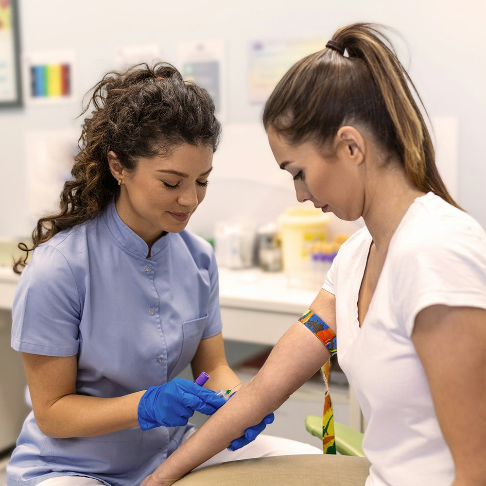 Woman having blood drawn