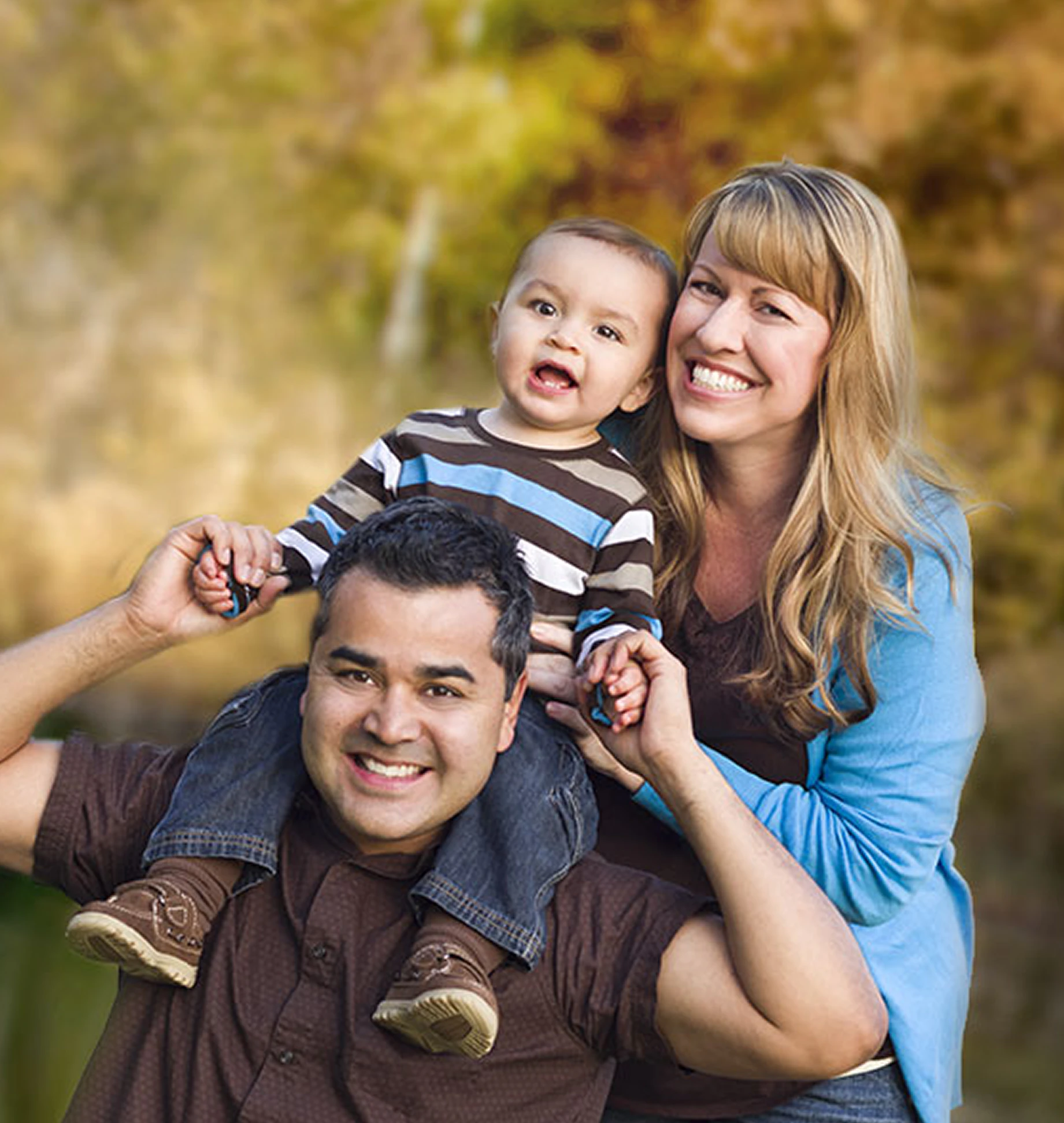 mom and dad with their son