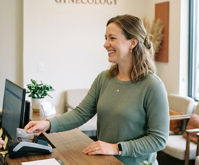 woman paying with credit card