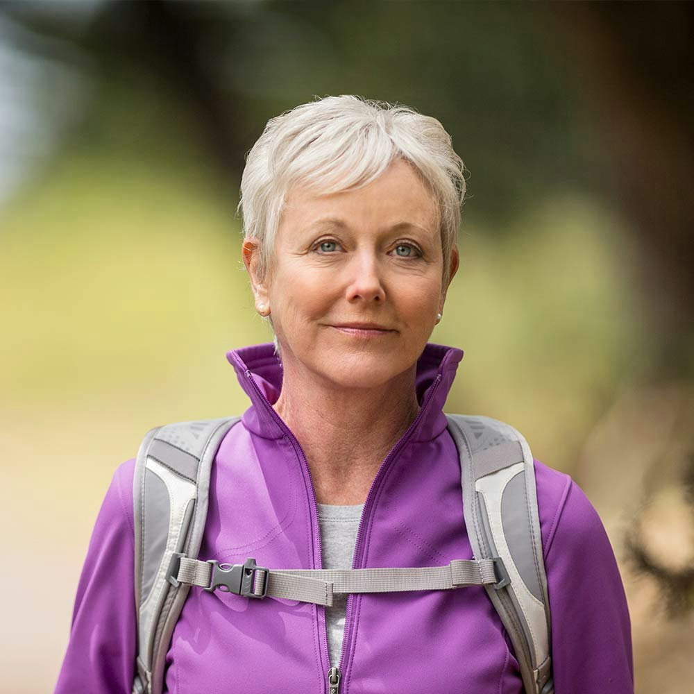 woman with gray hair and blue eyes