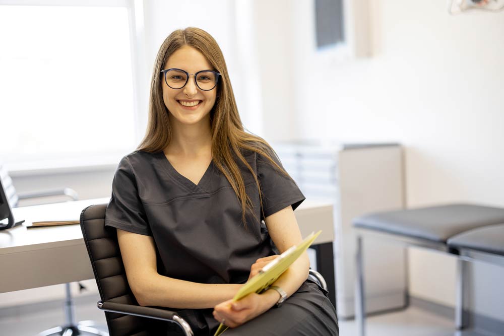 smiling office team member