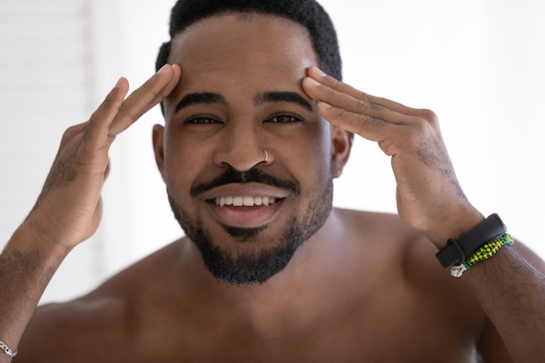 Man holding his forehead