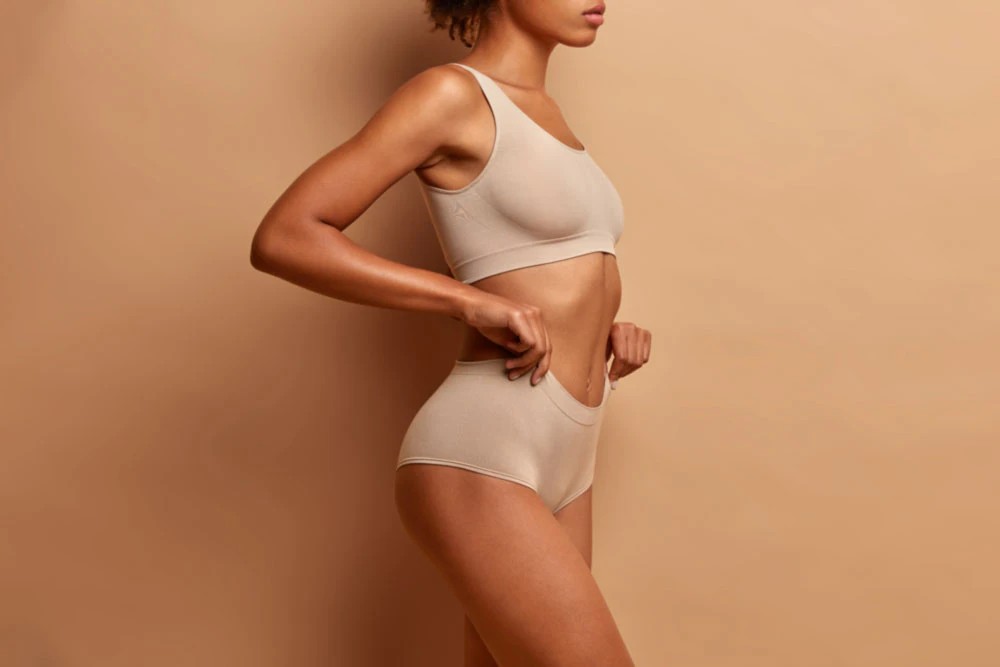 woman in beige underwear