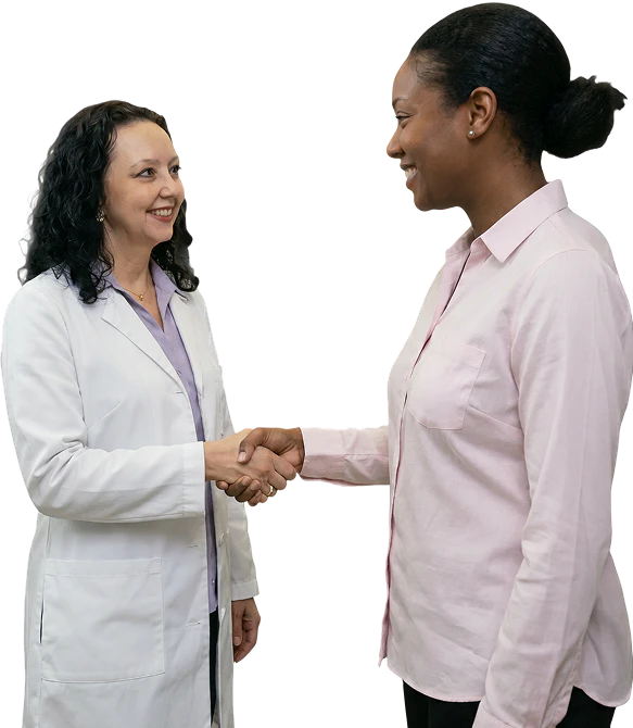 Dr. Madjidi shaking hands w/ a patient