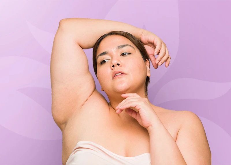 woman posing with arm above head