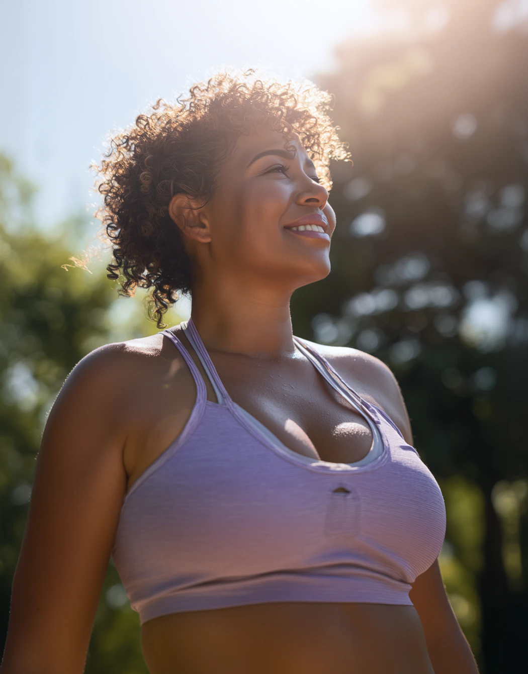 woman smiling in the sunlight