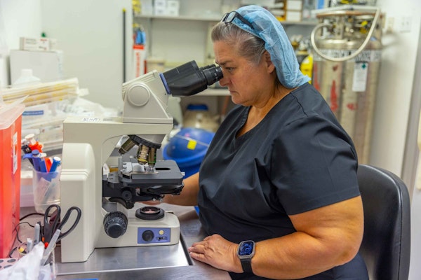 Doctor and microscope