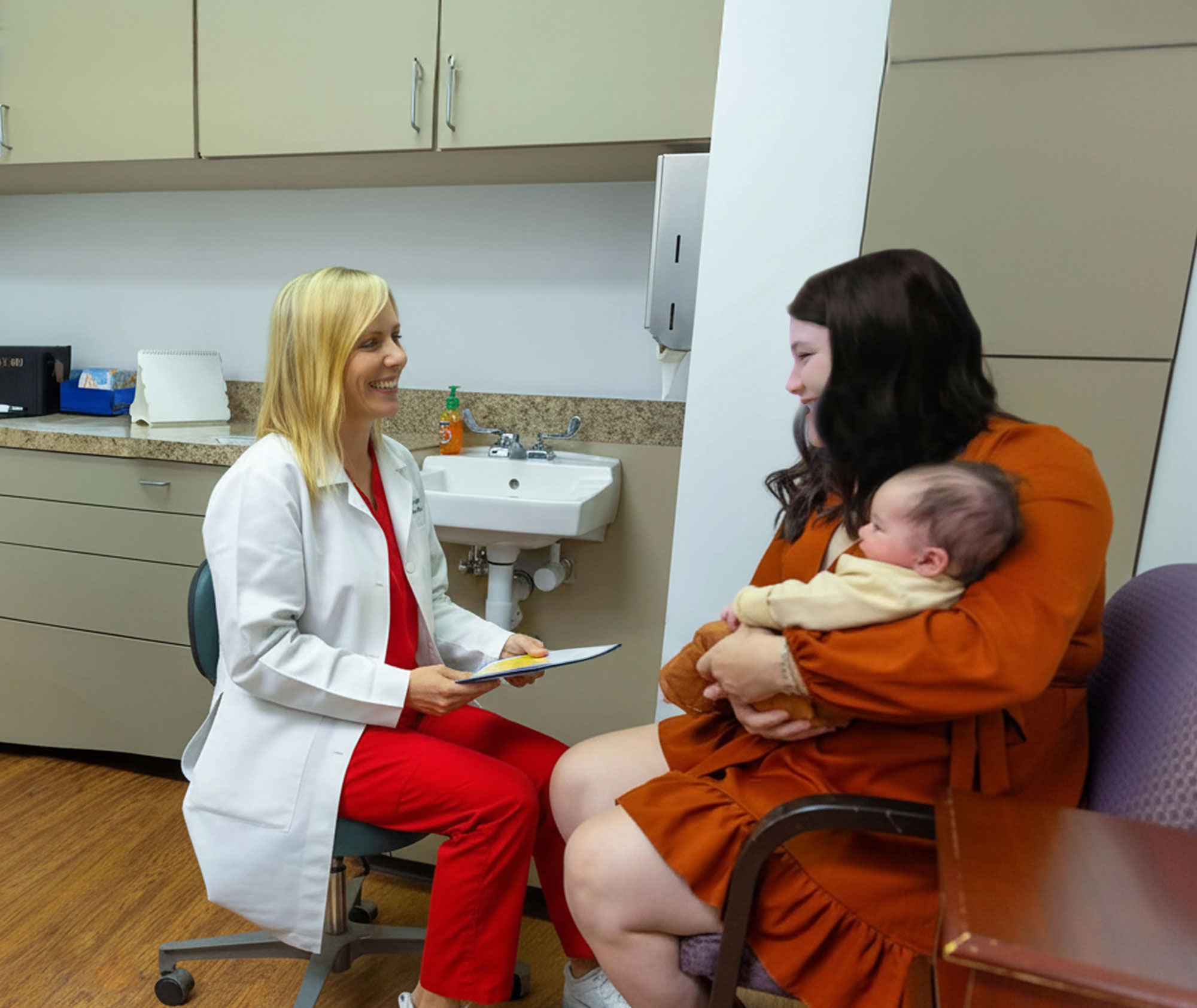 Dr. Kristiansen speaking with a successful patient