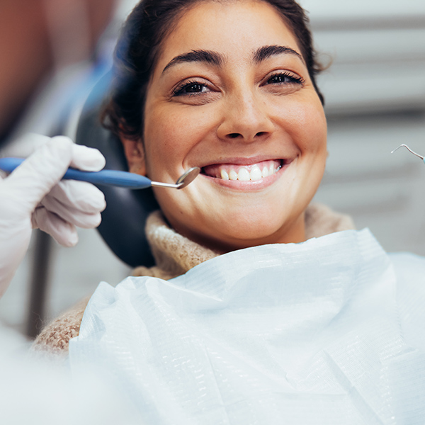 Smiling woman at dental exam