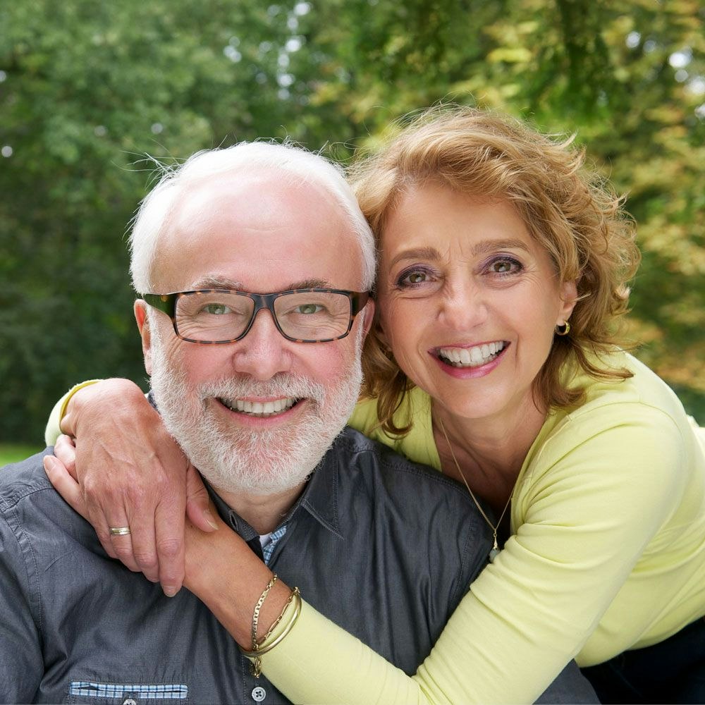 Older man and woman smiling